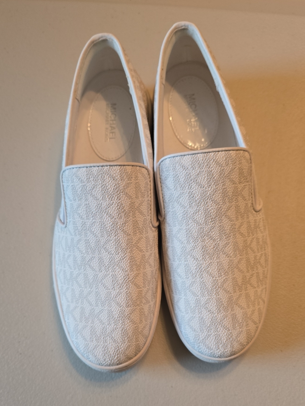 Michael Kors White Womens Monogram Slip-On Sneakers